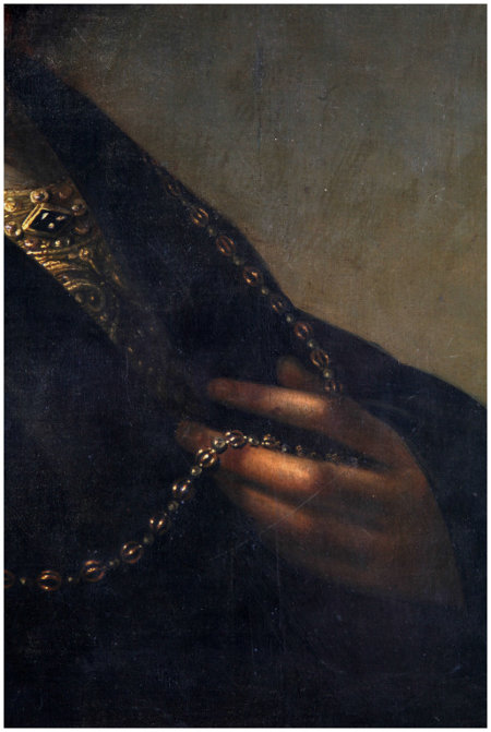 Click the image for a view of: Detail of the hand and chain